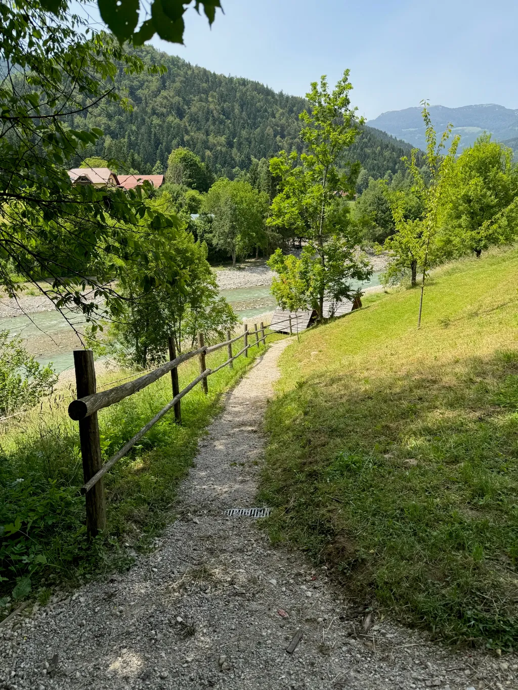 pitch in meadows next to alpine river