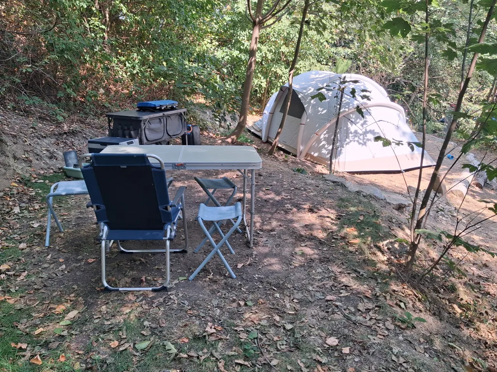 Off grid nature campsite in private forest garden